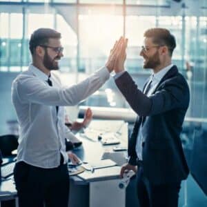 Tech engineers high fiving because their job is easy 71490 (1)